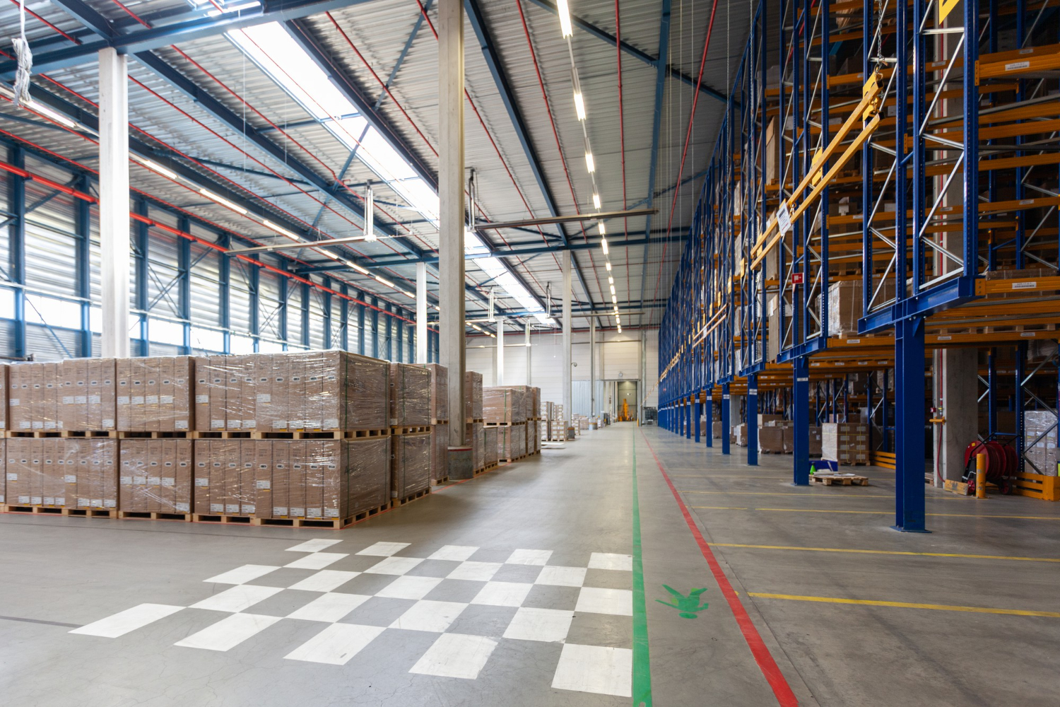 Organised warehouse staging showing scale and disciplined operations